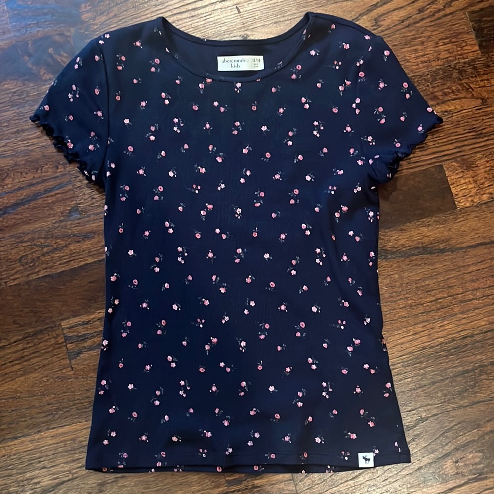 navy shirt with pink flowers